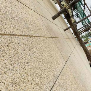 绵阳 黄金麻花岗岩荔枝面外墙干挂石材效果示例